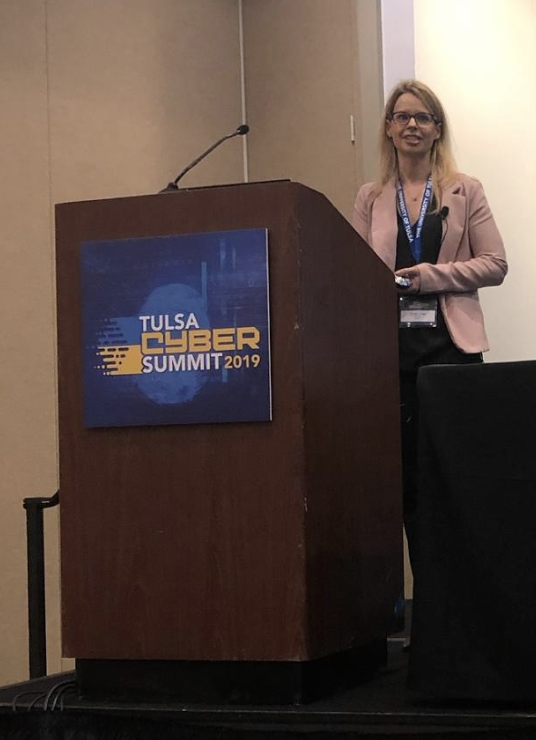Crystal Lister speaking on insider risk at the Tulsa Cyber Summit